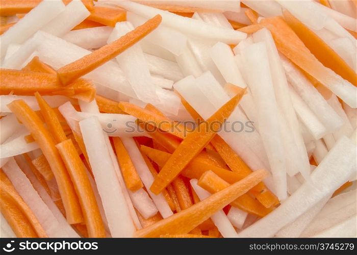 Background of sliced radish and carrot