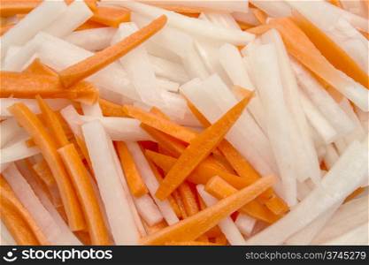 Background of sliced radish and carrot