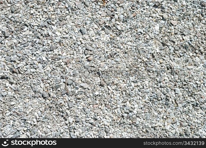 Background of small light stones. Small stones