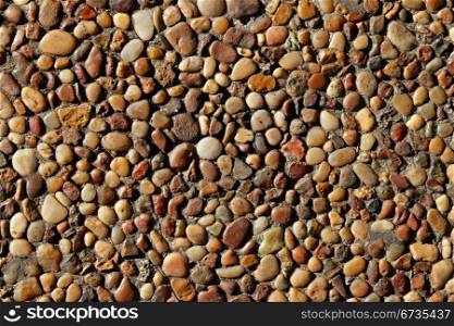 Background of small smooth stone pebbles