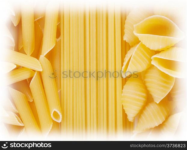 Background of spaghetti twisted and straight raw pasta