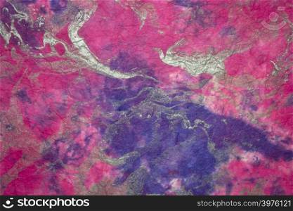 background of textured handmade Thai marbled momi mulberry paper