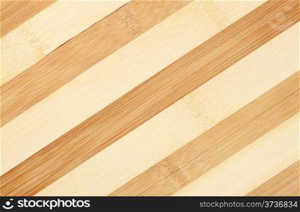 Background of treated wood with dark and light stripes
