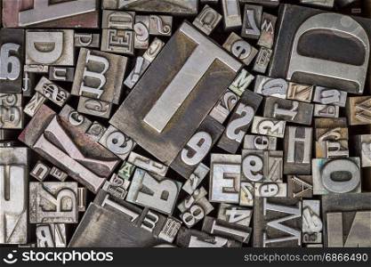background of vintage letterpress metal type printing blocks