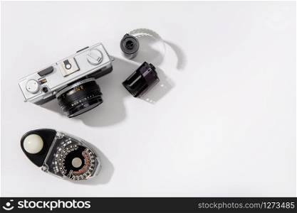 Background of vintage photo camera. Rangefinder film camera. Gray background. Copy space