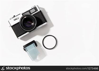 Background of vintage photo camera. Rangefinder film camera. Gray background. Copy space