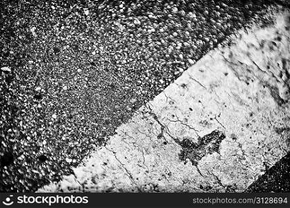 background of wet gray asphalt . Detail of asphalt road