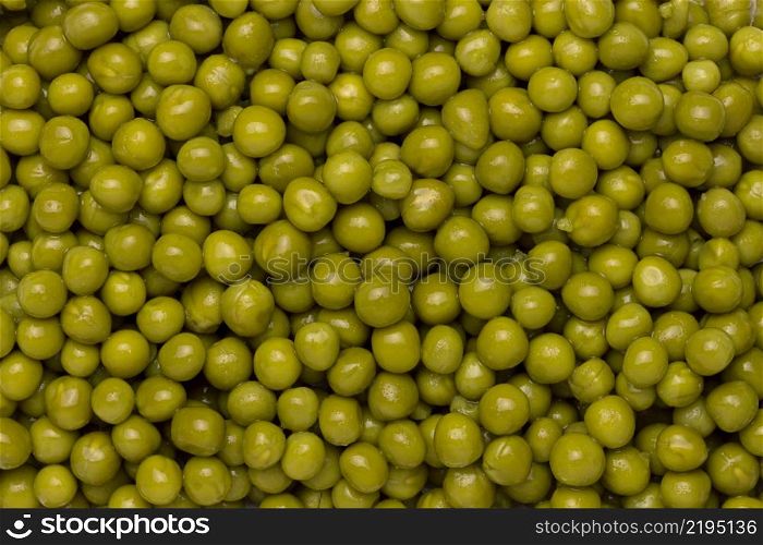 background of wet green peas close up. background of wet green peas