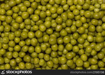 background of wet green peas close up. background of wet green peas