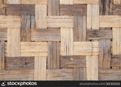 Background of woven wood Polished wood woven into the background of the wall.