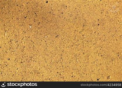 Background of yellow stone wall texture pattern