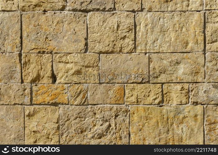 Background or texture of old vintage stone wall. Background of old vintage stone wall