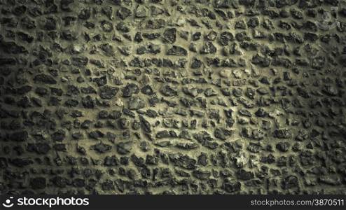 Background or texture pattern gray color of style design decorative uneven cracked stone wall surface with cement