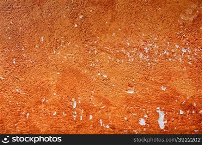 Background painted wall with damage to orange