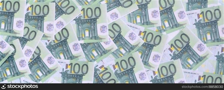 Background pattern of a set of green monetary denominations of 100 euros. A lot of money forms an infinite heap