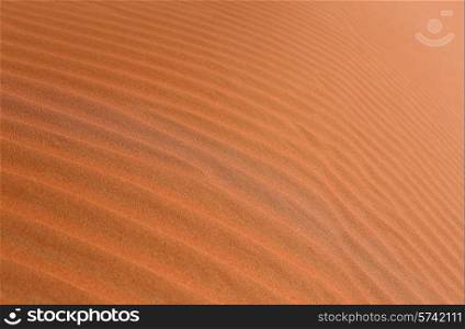 Background red desert sand in Dubai at sunset