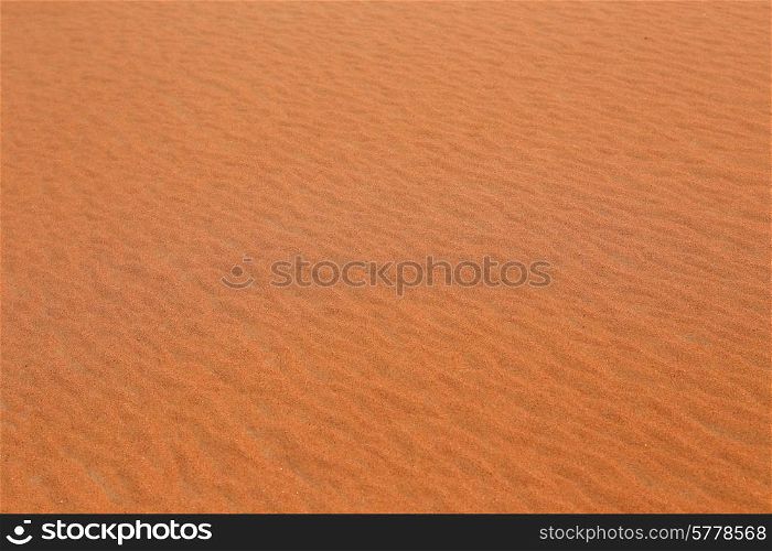 Background red desert sand in Dubai at sunset