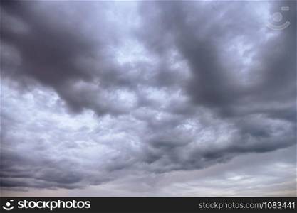 Background storm clouds over ocean