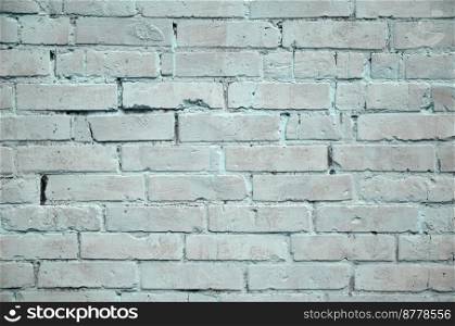Background texture of old brick wall, painted in blue