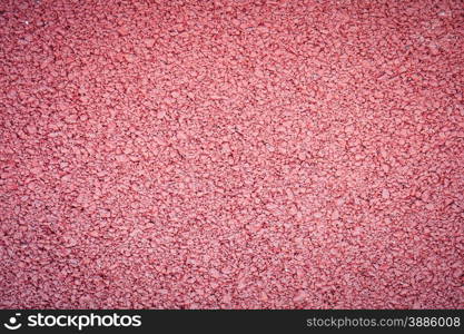 background texture of rough red asphalt