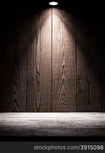 Background texture of wooden boards with illumination from above. Background texture of wooden boards