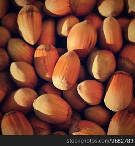 Background with hazelnuts. Healthy autumn nuts.