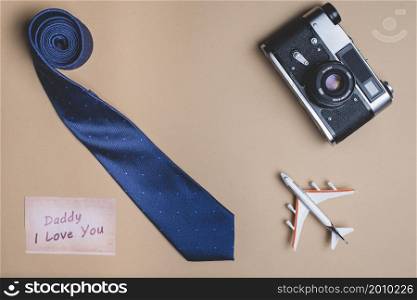 background with necktie plane camera father s day