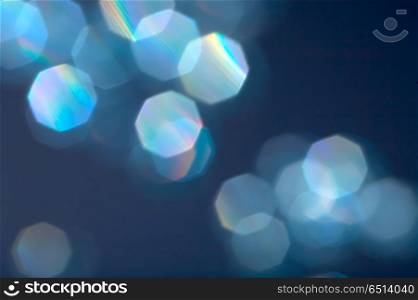 Background with reflexions on a dark blue background. Blue reflexions