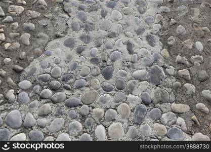 Background with rounded stones closeup