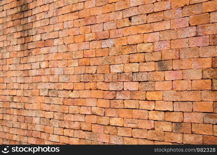 Backgrounds and pattern of ancient brick walls orange.
