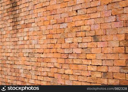 Backgrounds and pattern of ancient brick walls orange.