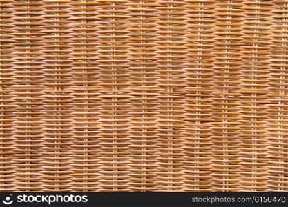 backgrounds and texture concept - close up of brown wicker surface background. close up of brown wicker surface background