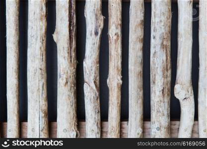 backgrounds and texture concept - fence or shutters of wooden sticks. fence or shutters of wooden sticks