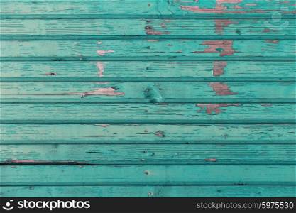 backgrounds and texture concept - old wooden fence painted in blue background. old wooden boards painted in blue background