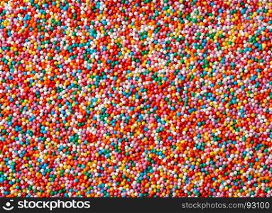 Backgrounds and textures: a lot of multicolored candy drops, confectionery abstract. Multicolored candy drops