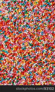 Backgrounds and textures: a lot of multicolored candy drops, confectionery abstract. Multicolored candy drops