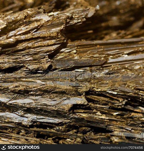 Backgrounds and textures: beautiful golden-brown crystals of ore mineral, abstract pattern, natural background. Abstract mineral texture