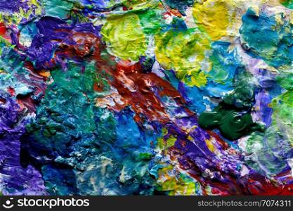 Backgrounds and textures: colorful paint spots, closeup shot, abstract texture. Artist palette with colorful paint spots