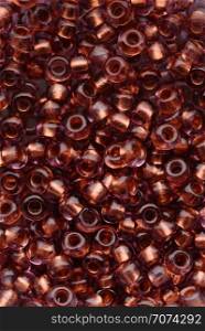 Backgrounds and textures: dark red beads assortment, abstract background. Dark red beads assortment
