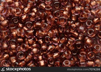 Backgrounds and textures: dark red beads assortment, abstract background. Dark red beads assortment