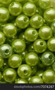 Backgrounds and textures: green beads assortment, abstract background. Green beads assortment