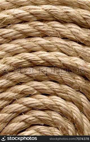 Backgrounds and textures: sisal rope arranged as background, close-up shot. Sisal rope