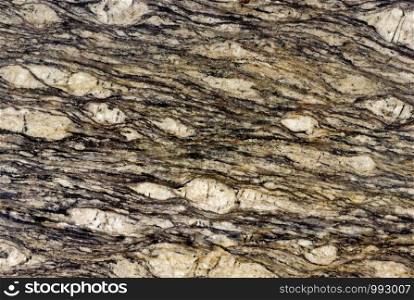 Backgrounds and textures: surface of beautiful decorative stone, abstract pattern of cracks, spots and stains, natural background. Abstract mineral texture