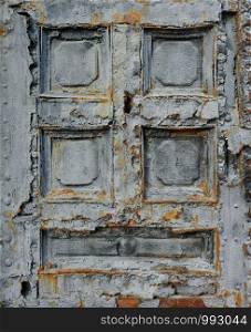 Backgrounds and textures: very old rusty weathered metal gate door. Very old gate door