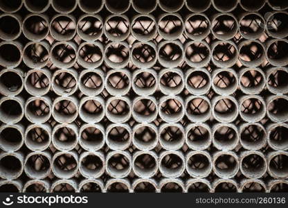 Backgrounds, patterns and textures concept. Dusty metal circles pattern, inside of machine. Metal circles pattern, inside of machine