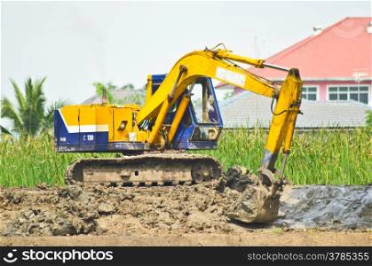 backhoe working for digging soil