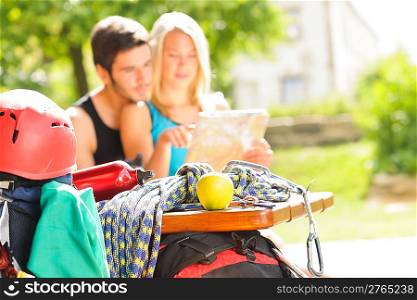 Backpack healthy young couple relax with climbing gear sunny terrace