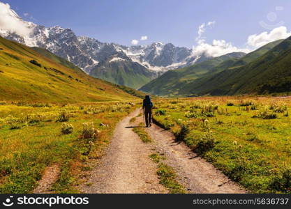 Backpacker in mountains