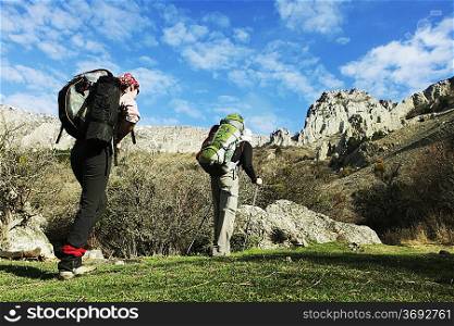 Backpackers in mountains