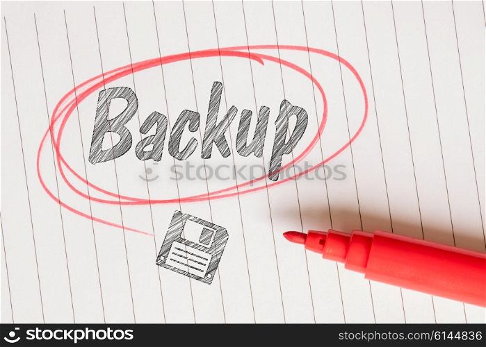 Backup note with a disk sketch and a red marker